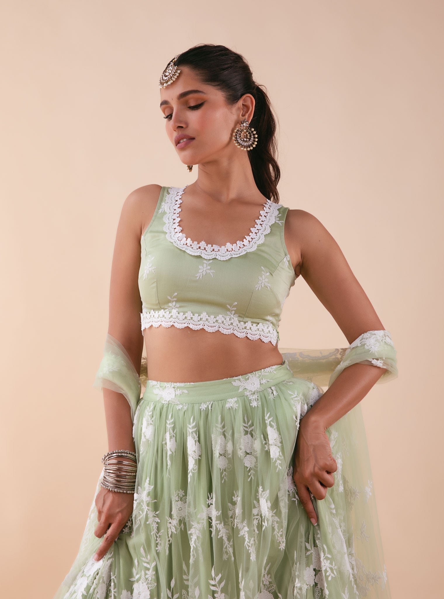 Almora Green Net Lehenga Set